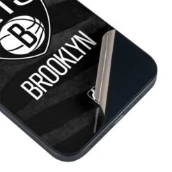 NBA Brooklyn Nets Black Animal Print IPhone 14 Plus Skin -Skinit Store brooklyn nets black animal print iphone 14 plus skin 1662574833 SKNAMLNBA03IPH14M PR 03