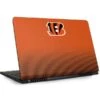 NFL Cincinnati Bengals Breakaway Dell Inspiron Skin -Skinit Store cincinnati bengals breakaway inspirion 15 5000 5577 gaming series skin 1527119263 SKNNFLBRK06DI5577 PR 01