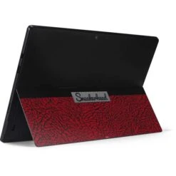 Elephant Print Red Sneakerhead Surface Pro 7 Skin -Skinit Store elephant print red sneakerhead surface pro 7 skin 1596227063 SKNELPHNT09MSSRP7 PR 02
