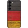 German Flag Dark Wood Galaxy S23 Skin -Skinit Store german flag dark wood galaxy s23 skin 1676574818 SKNTFDKWD11GLXY23 PR 01 defa67ce eb18 4e22 ad54 e90f96b962f0