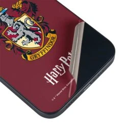 Wizarding World Harry Potter Gryffindor House Crest IPhone 14 Skin -Skinit Store gryffindor house crest iphone 14 skin 1680903611 SKNHRYPTR05IPHN14 PR 03