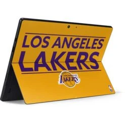 NBA Los Angeles Lakers Standard - Gold Surface Pro 7 Skin -Skinit Store los angeles lakers standard gold surface pro 7 skin 1596227044 SKNNBATMS14MSSRP7 PR 02