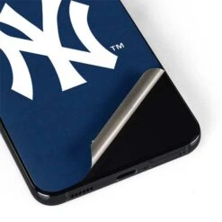 MLB New York Yankees - Solid Distressed Galaxy S22 Plus Skin -Skinit Store new york yankees solid distressed galaxy s22 plus skin 1679492806 SKNMLBNYY10GLX22P PR 04