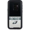 NFL Philadelphia Eagles White Striped Otterbox Defender Galaxy Skin -Skinit Store philadelphia eagles white striped otterbox defender galaxy s9 plus skin 1609426780 SKNNFLWHT24OBS9PD PR 01