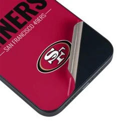 NFL San Francisco 49ers Team Motto IPhone 15 Skin -Skinit Store san francisco 49ers team motto iphone 15 skin 1694705046 SKNNFLSLG28IPHN15 PR 03