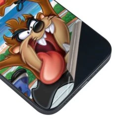Looney Tunes Tasmanian Devil Surfboard IPhone 15 Skin -Skinit Store tasmanian devil surfboard iphone 15 skin 1694705119 SKNXLONEY03IPHN15 PR 03