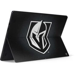 NHL Vegas Golden Knights Black Background Surface Pro 6 Skin -Skinit Store vegas golden knights black background surface pro 6 skin 1540490860 SKNBLKNHL31MSSRP6 PR 02