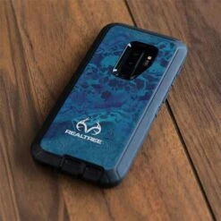 RealTree WAV3 Blue Camo Otterbox Defender Galaxy Skin -Skinit Store wav3 blue camo otterbox defender galaxy s9 plus skin 1698327571 SKNRELTRE04OBS9PD PR 04